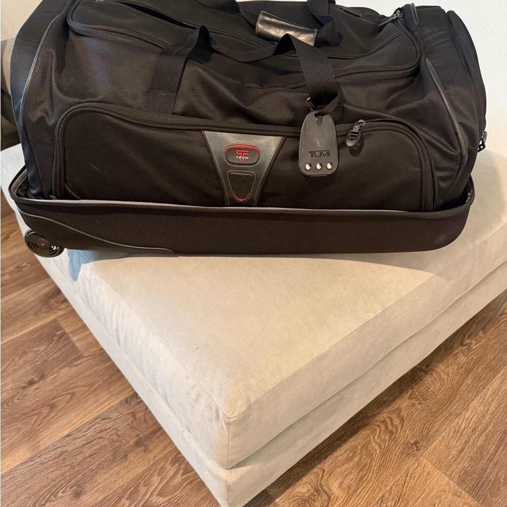 TUMI Black Rolling Duffel Bag